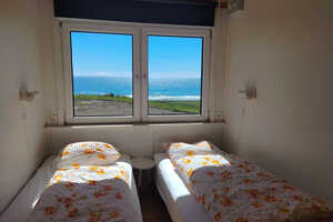 シンプルなゲストハウス。トイレ・シャワーは共同となります。